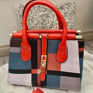 Color Block Medium Handbag with Shoulder Strap Included.